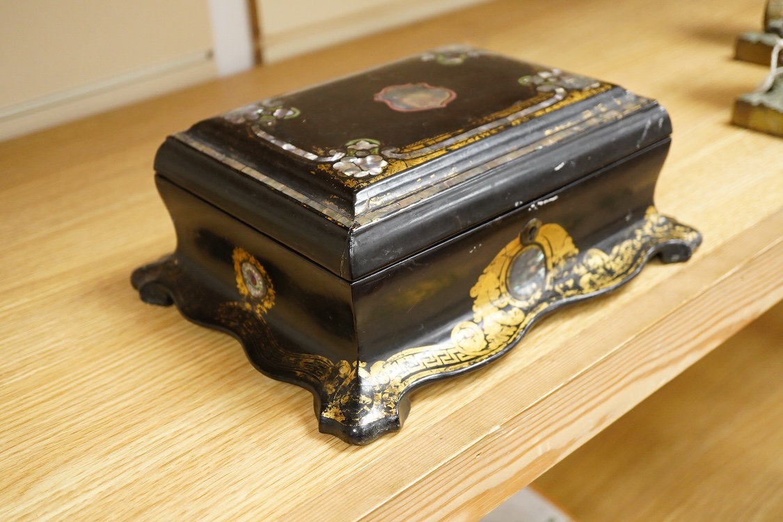A Victorian papier maché jewellery box, abalone inlaid, 25cm wide
